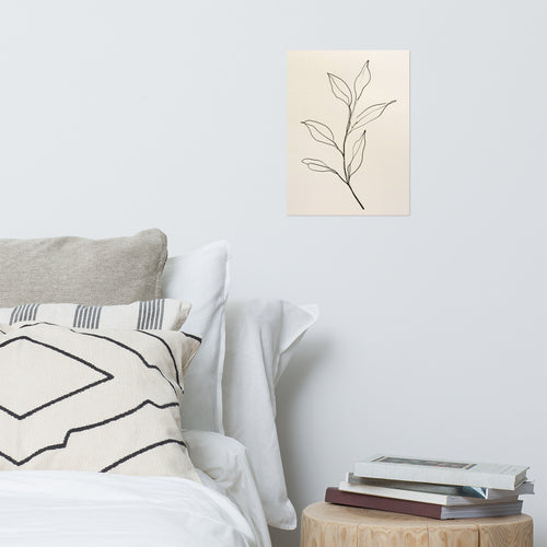 Mockup of minimalist ink line drawing of a leafy branch on warm cream paper