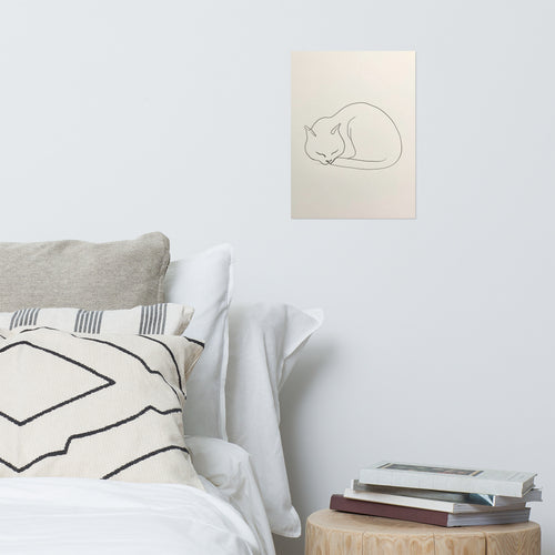 Mockup of minimalist line art drawing of a sleeping curled cat on warm paper