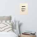 Mockup of four smooth horizontal black ink brushstrokes evenly spaced on warm cream paper