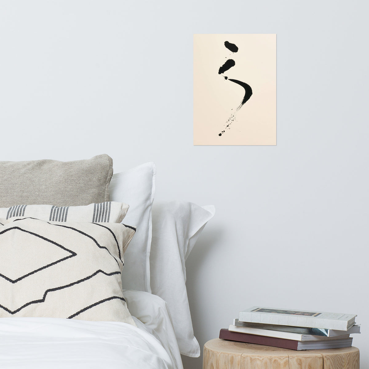 Mockup of curved black ink cascade with fine spray on cool cream paper